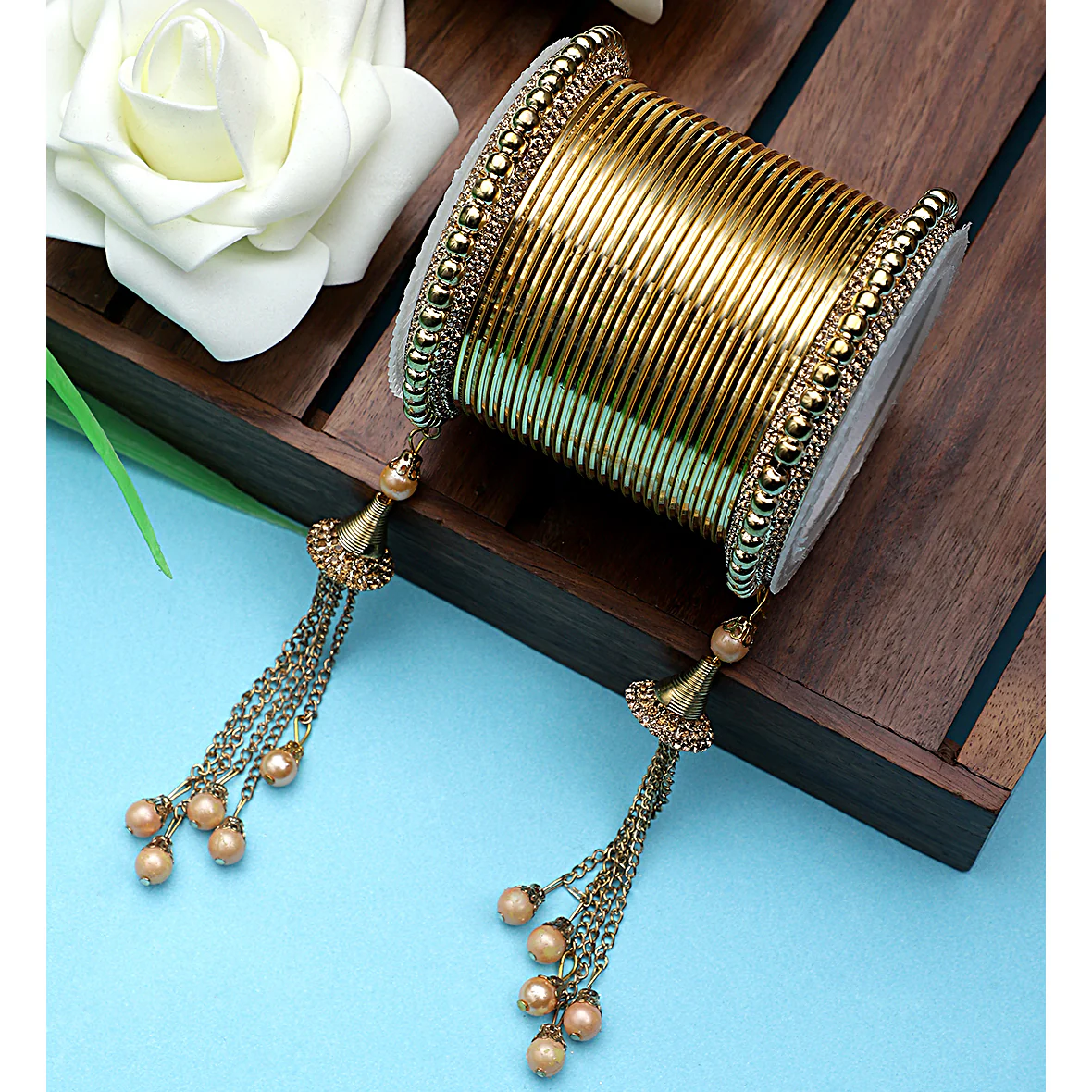 Golden Jhumki with Shining Metal Bangles by Leshya