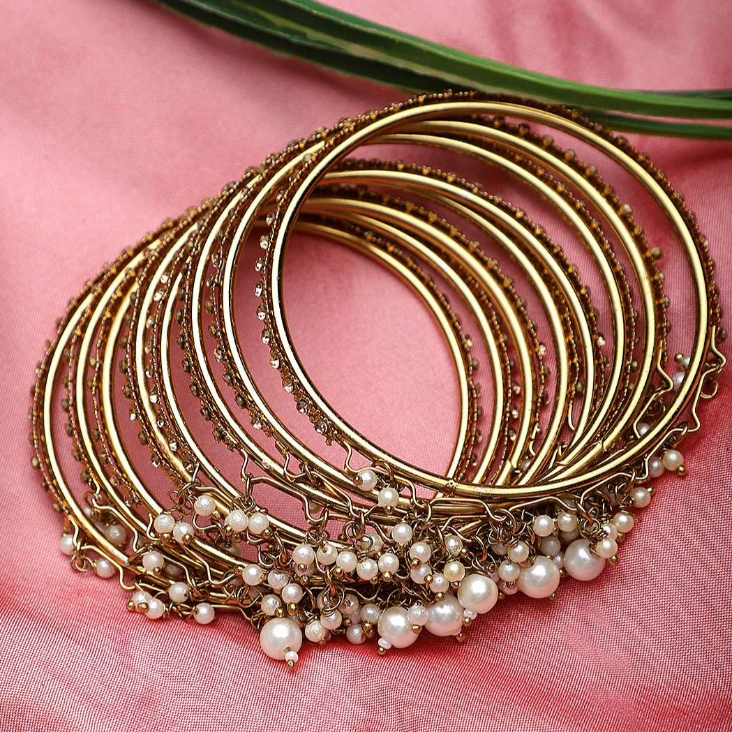 Set of 8 Golden Ghungroo Bangles with Golden Stone by Leshya - Image 3